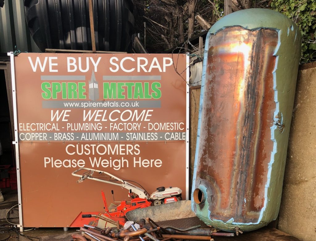 Picture of old scrap metal tank on Spire Metals branded weighing station